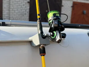 Fishing rod holder for PVC boats