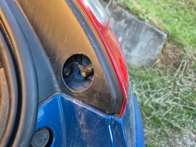 Megane II tail light bolt mount repair