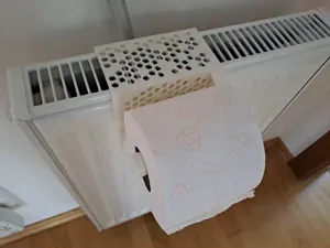 toilet paper holder for standard heater