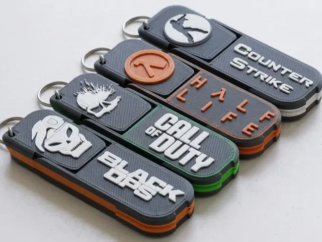 Llaveros Porta Celular Shooter