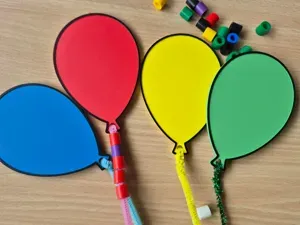 Ballon – fijne motoriek met pijpenrager en kralen