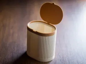 Ribbed oval trash bin