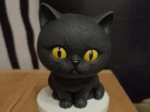 Black Cat Figurine with Yellow Eyes