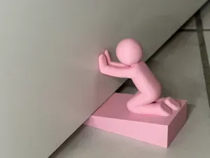 Türstopper sitzendes Männchen