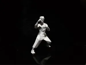 Low - polygon Bruce Lee Sculpture
