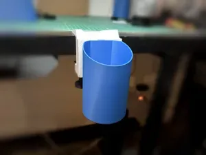 Clip. Modular desk bin that clamps on