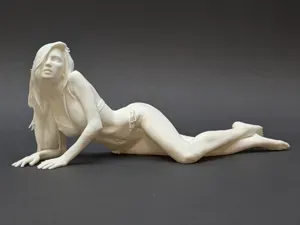 Graceful Reclining Beach Woman