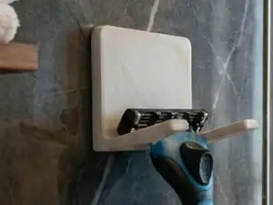 Shower Shaver Holder • Slim, Secure & Tape‑Mounted
