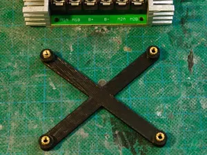 Holder for Sabertooth 2x32A Dimension Engineering