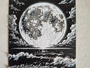 Pleine Lune sur la mer agitée