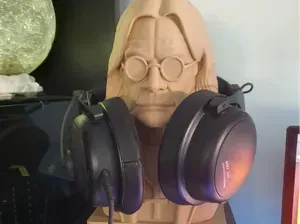 Ozzy with iconic cross headphone hanger (Rip)