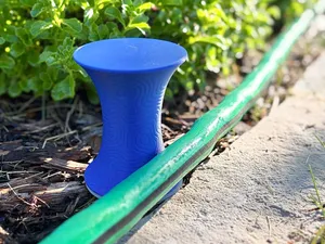 Rotating Garden Hose Guide | Protects Landscaping