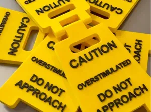 Overstimulated desk sign