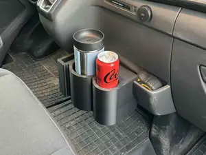 Cup and phone holder for a Ford Transit