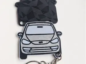 one sided key ring with the front of a Ford Galaxy