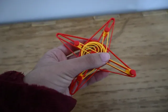 Quadruple piston fidget. — Image 3 of 5