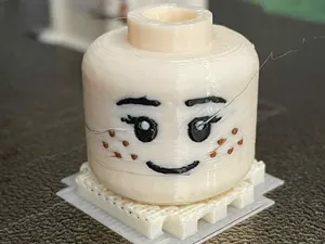 Big Brick Freckled Female Face