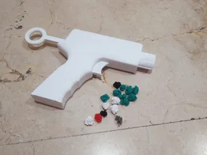 Pistola lanza purgas / pelotas
