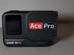 Insta360 Ace Pro lens cover with hole for strap