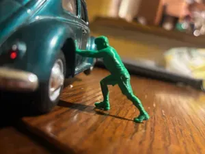 diorama miniature - pushing or stretching man