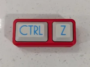 Undo Keyring Fidget Clicker