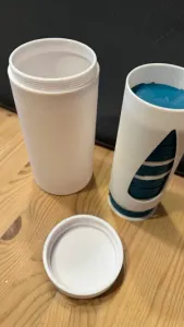 7-day pill box with dispenser and travel container with screw cap