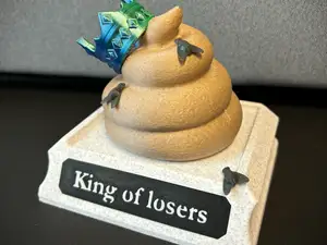 "King of Losers" poop trophy