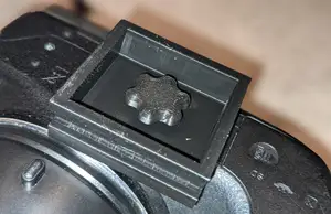 Cam locking camera mount for quick release tripod
