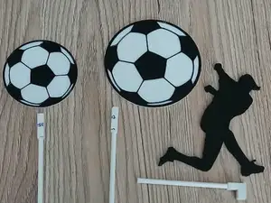 Footballer (soccer player) and ball