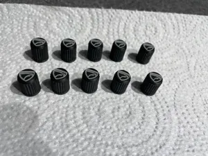 Eagle Amc Talon Valve stem caps .2 Nozzle needed
