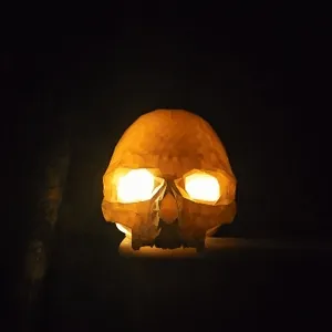 Skull with Glowing Eyes (LED Tea Light Candle)