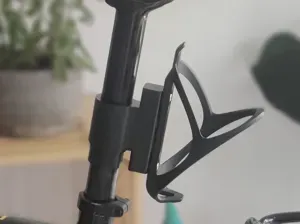 Adaptateur porte bidon pour tige de selle