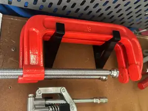 Strong Wall Brackets for Tools in Garage Workshop