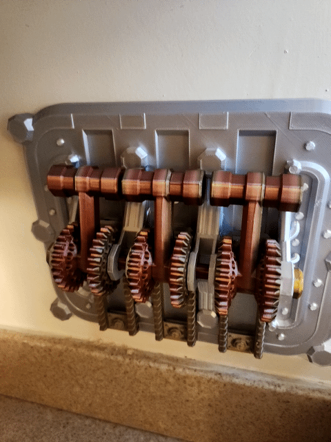 Triple Gear and Lever Light Switch Plate