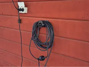 Cable holder (for engine heater cable)