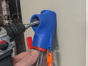 Dust collection attachment for drinks bottle.