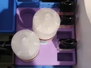 Gridfinity holder for XROS mini pods and 3 juice