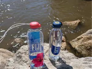Carry Cap (water bottle strap accessory)