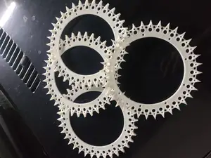Wheel spike add-on for robot lawn mower