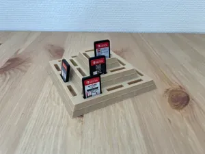 Pyramid style Nintendo Switch game cartridge stand