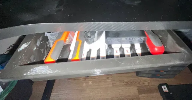 Drawer under the table.