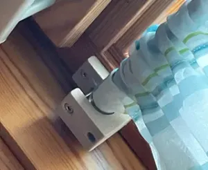 Holder for curtain rod with fixing screw printed with wood filament