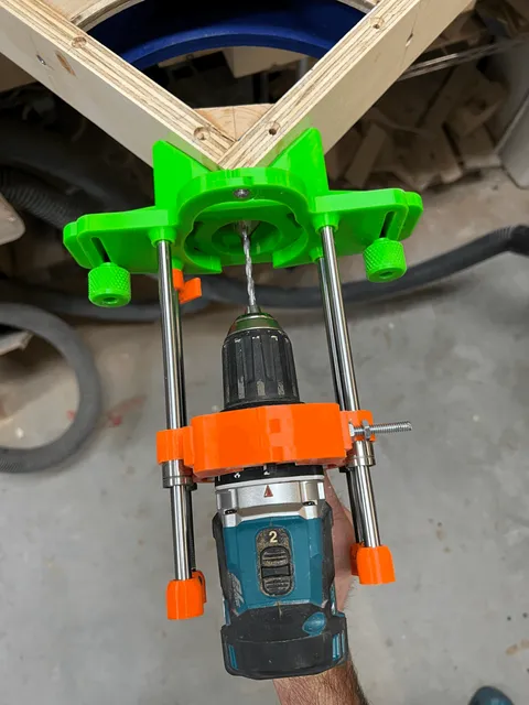 Portable drill press with large base and optional right angle corner jig.