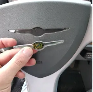 Logo on the steering wheel of Chrysler