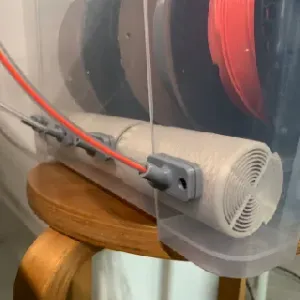 Bowden tube end cap for drybox