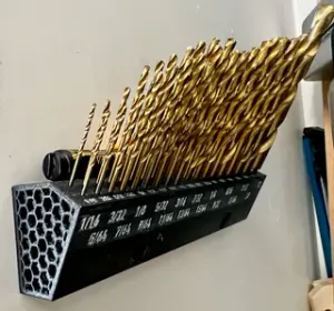 Wall mounted drill bit holder