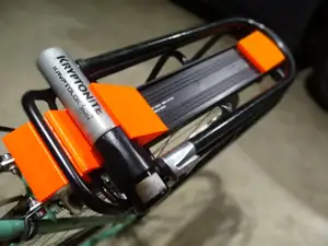 Bicycle U-Lock Holster for Track Bike Rack