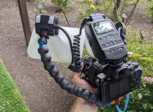Twin loc-line arm mount for camera tripod socket