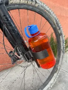 Bikepacking suspension bottle cage