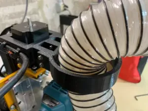 Dust Collection Hose Retaining Assembly